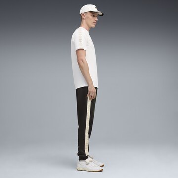 PUMA Tapered Sports trousers 'FC Red Bull Salzburg KING Anthem' in Black