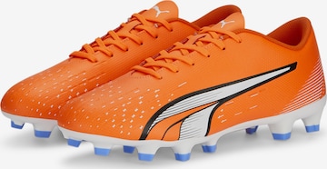 Chaussure de foot PUMA en orange