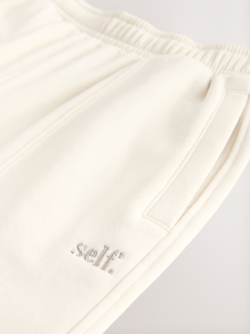 Effilé Pantalon self. en beige