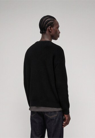 Pull-over Karl Kani en noir