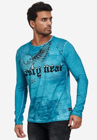 Rusty Neal Langarmshirt mit coolem Front- Print in Blau: predná strana