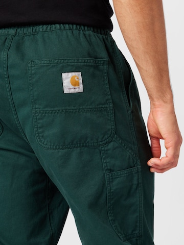 Carhartt WIP - Loosefit Calças 'Flint' em verde