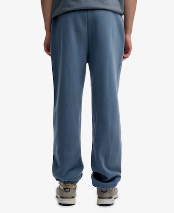 Superdry Tapered Broek in Blauw