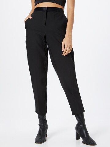 Tapered Pantaloni con piega frontale di River Island in nero: frontale