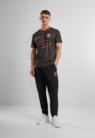 Karl Kani - Camiseta de fútbol en negro