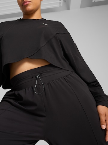 PUMA Wide leg Sports trousers 'CLOUDSPUN' in Black