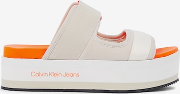 Calvin Klein Jeans Mules in Beige