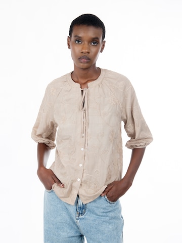 Influencer - Blusa en beige: frente