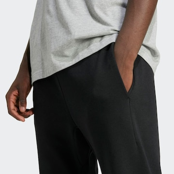 ADIDAS SPORTSWEAR regular Παντελόνι φόρμας 'Essential' σε μαύρο