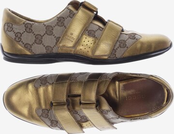 Gucci Sneakers & Trainers in 37 in Gold: front