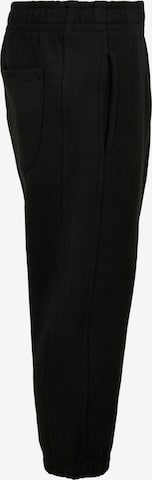 Tapered Pantaloni di Urban Classics in nero