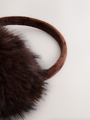 Cache-oreilles Next en marron