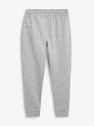 Next Tapered Housut värissä harmaa