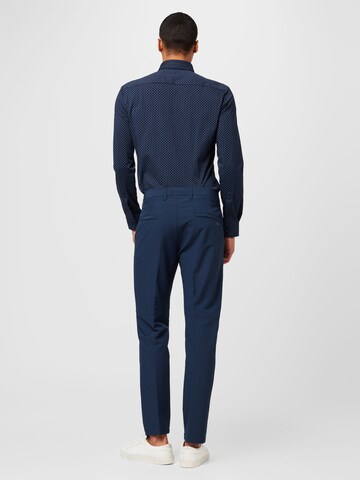 Coupe slim Pantalon chino 'Commuter' BOSS en bleu