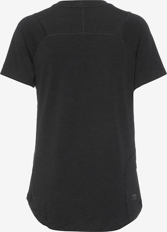 PUMA Функциональная футболка 'Seasons' в Черный