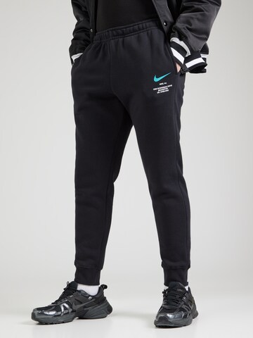 Nike Sportswear Alt kitsenev Püksid, värv must: eest vaates