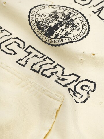 ENRAGE Sweatshirt 'ENRAGE THE SOUND VICTIMS' in Gelb