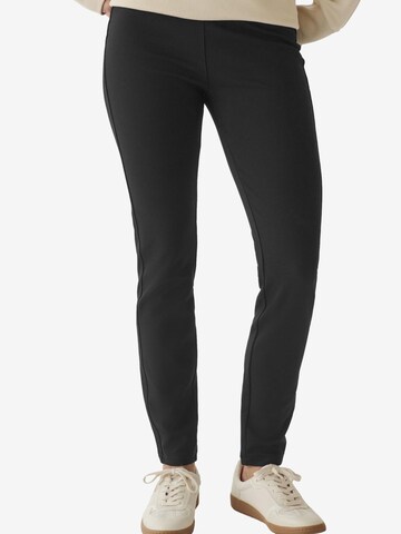 Next Skinny Leggings in Black: front
