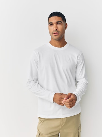 Next Shirt in Blue: front