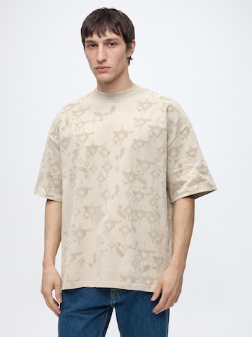 Maglietta di Carlo Colucci in beige: frontale