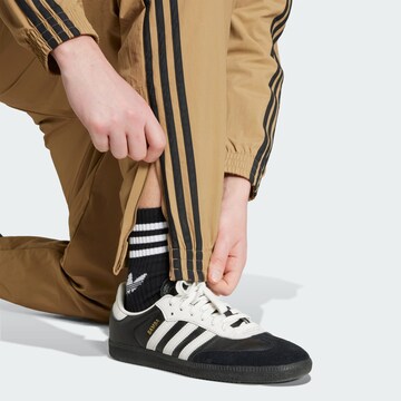 ADIDAS ORIGINALS Конический (Tapered) Штаны 'Adicolor Firebird' в Коричневый