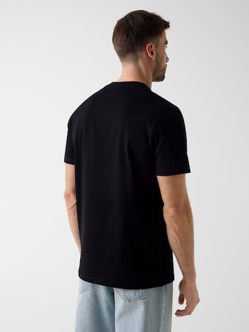 GUESS T-Shirt in Schwarz