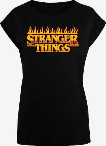 T-shirt 'Stranger Things Fire Netflix TV Series' F4NT4STIC en noir : devant