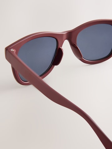 Lunettes de soleil Next en rouge
