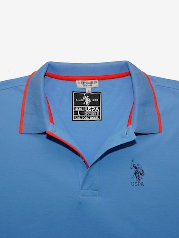Maglietta 'CAAD' di U.S. POLO ASSN. in blu