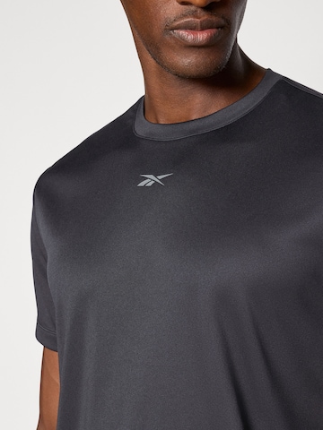 Reebok - Camisa funcionais 'ID TRAIN' em preto