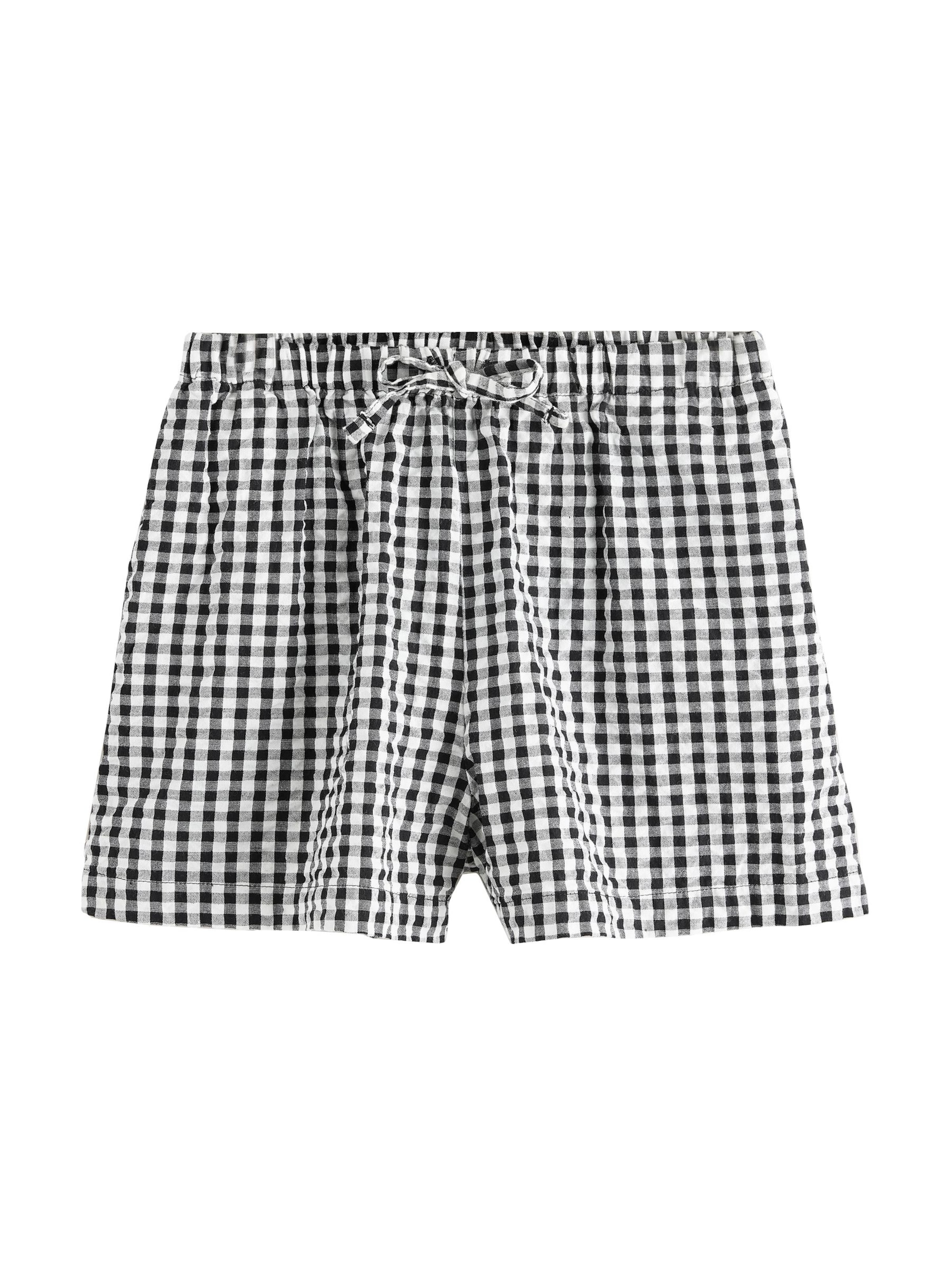 Next - Calças em preto: frente