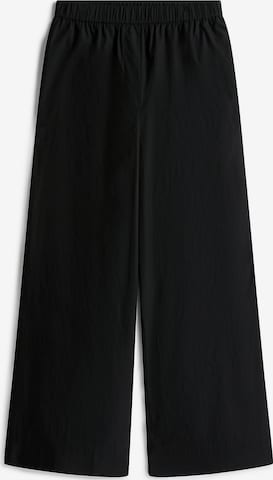 Pantalon TOMMY HILFIGER en noir : devant