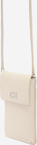 Calvin Klein Regular Crossbody bag in Beige