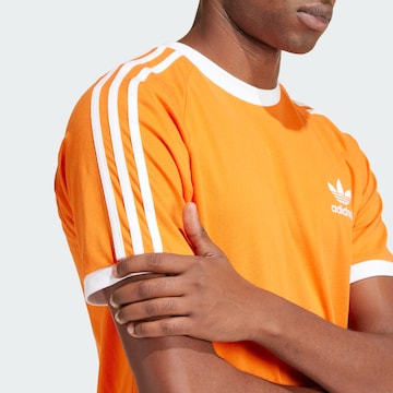 ADIDAS ORIGINALS - Camiseta 'Adicolor Classics' en naranja