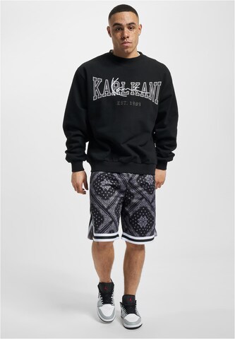 Karl Kani Loosefit Shorts in Schwarz