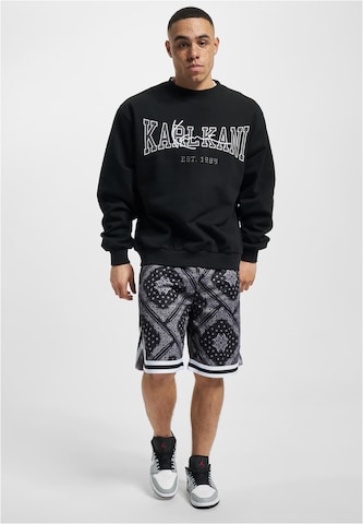 Karl Kani Loosefit Shorts in Schwarz