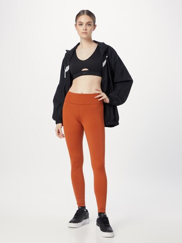 NIKE Skinny Workout Pants 'One' in Yellow