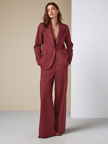 Wide leg Pantaloni con piega frontale di Next in marrone