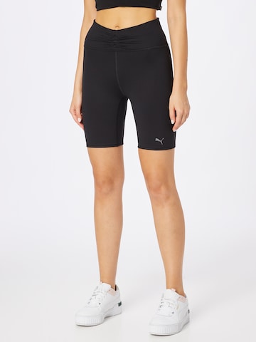 PUMA Skinny Workout Pants in Black: front