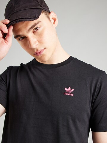 ADIDAS ORIGINALS Paita 'Training Supply Fashion Arty' värissä musta