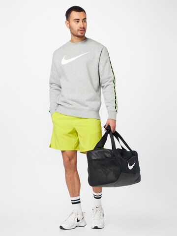 NIKE Regular Workout Pants in Green