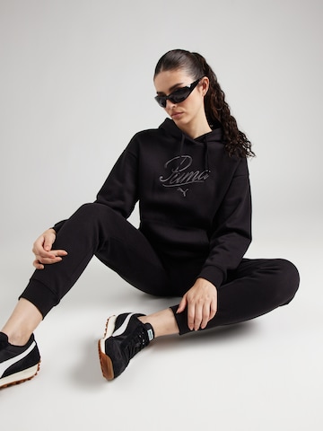 PUMA - Camiseta deportiva 'ESS' en negro