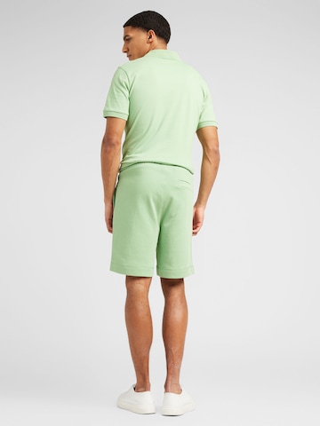 BOSS Orange Normalny krój Spodnie 'Sewalk' w kolorze zielony