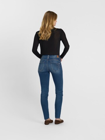 Coupe slim Jean Le Temps Des Cerises en bleu
