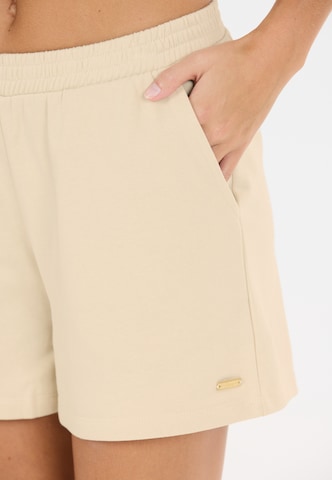 Athlecia Regular Shorts 'Crecy' in Beige