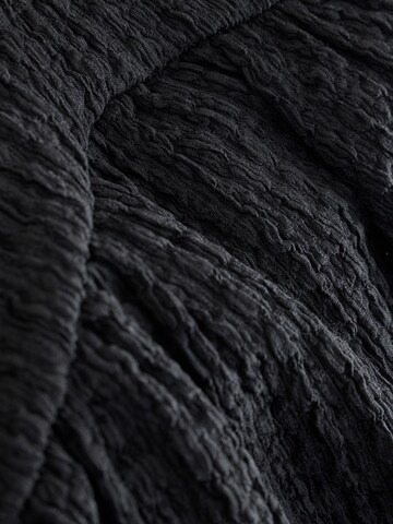 Robe Next en noir