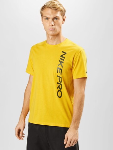 NIKE Regularny krój Koszulka funkcyjna w kolorze żółty: przód