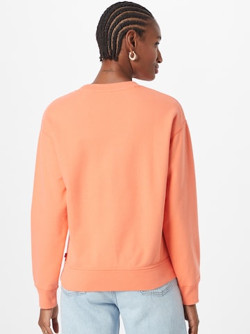LEVI'S ® Sweatshirt i oransje