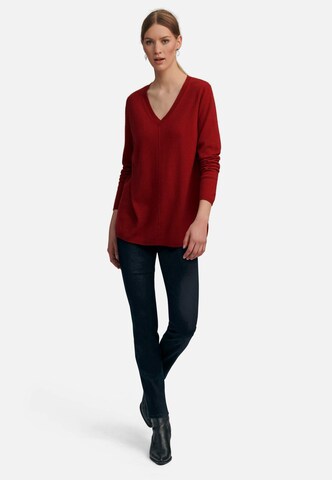 Pull-over include en rouge