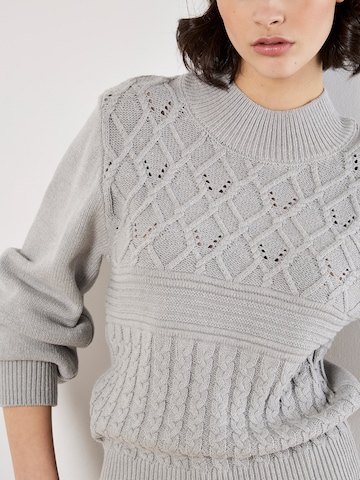 Pull-over ' ' Apricot en gris